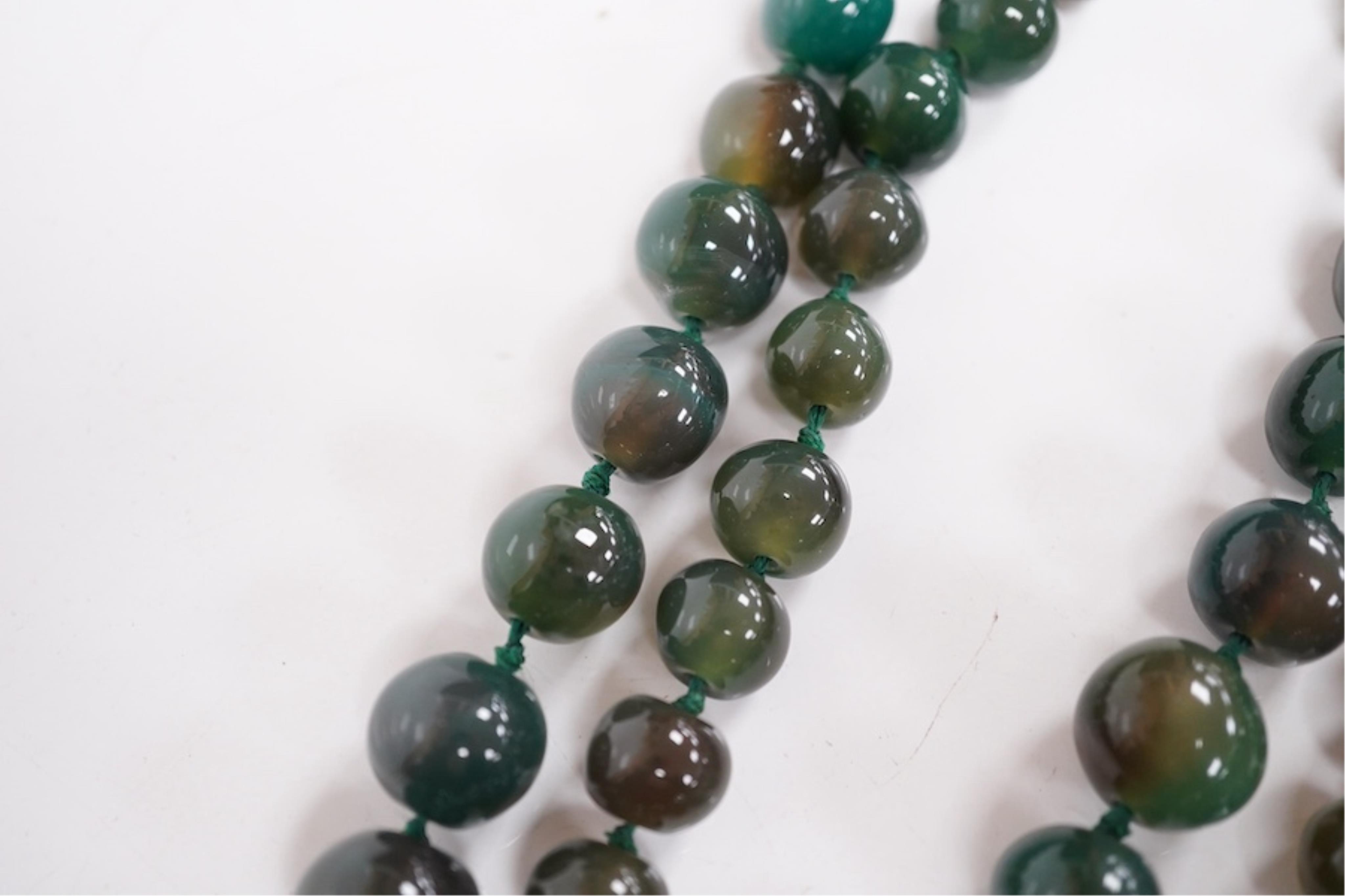 An early 20th century hardstone beaded necklace. Condition - fair